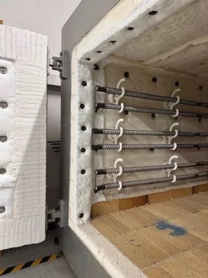 Completed internal oven relining around the heating elements